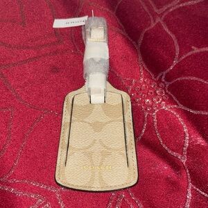 Coach 🆕 signature monogram Luggage Tag